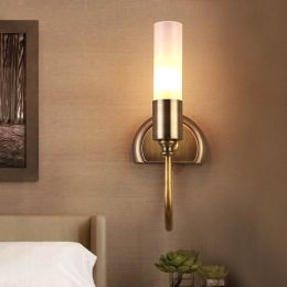 Rustic Cylinder Glass Shade 1-Light Indoor Wall Sconce with Curved Arm in Brass